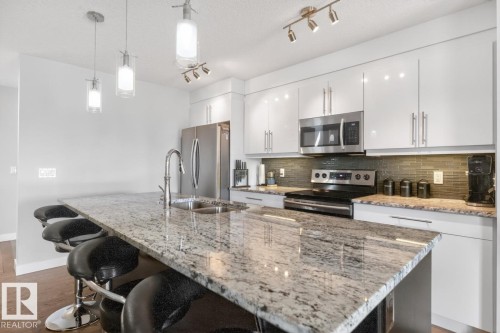 7135 Cardinal Way, Edmonton, AB - Indoor Photo Showing Kitchen With Stainless Steel Kitchen With Double Sink With Upgraded Kitchen