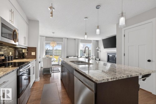 7135 Cardinal Way, Edmonton, AB - Indoor Photo Showing Kitchen With Stainless Steel Kitchen With Double Sink With Upgraded Kitchen