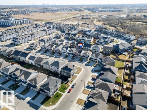Aerial perspective showcasing a residential development with multiple detached and attached homes - 2011 207 Street, Edmonton, AB - Outdoor With View