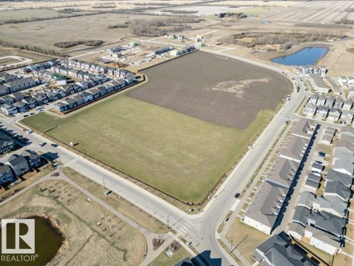 Expansive developable land bordered by established residential areas and paved roadways - 2011 207 Street, Edmonton, AB -  With View