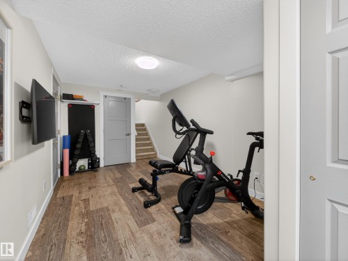 25 420 Hunters Green, Edmonton, AB - Indoor Photo Showing Gym Room