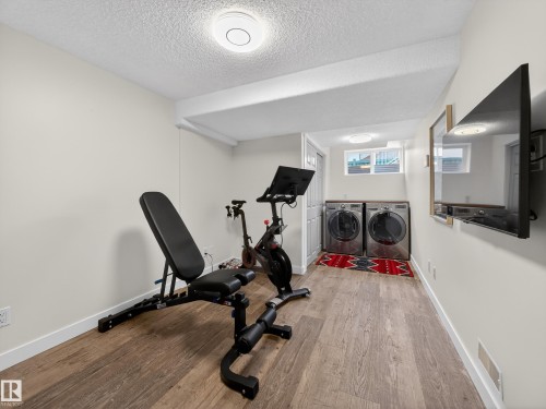 25 420 Hunters Green, Edmonton, AB - Indoor Photo Showing Gym Room