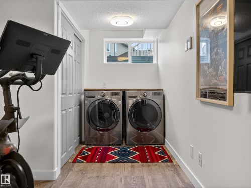 25 420 Hunters Green, Edmonton, AB - Indoor Photo Showing Laundry Room