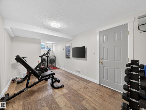 25 420 Hunters Green, Edmonton, AB - Indoor Photo Showing Gym Room