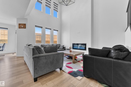 2315 51 Street, Edmonton, AB - Indoor Photo Showing Living Room With Fireplace