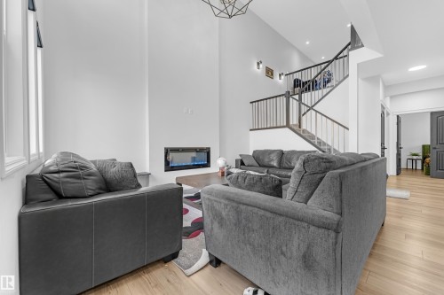 2315 51 Street, Edmonton, AB - Indoor Photo Showing Other Room With Fireplace