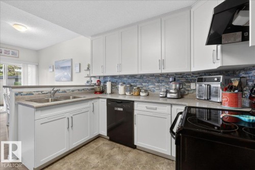 17 1179 Summerside Drive, Edmonton, AB - Indoor Photo Showing Kitchen With Double Sink