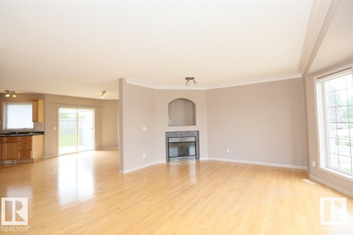 10903 8 Avenue, Edmonton, AB - Indoor Photo Showing Living Room With Fireplace