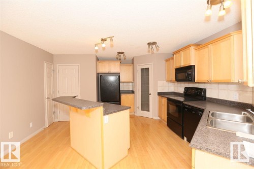 10903 8 Avenue, Edmonton, AB - Indoor Photo Showing Kitchen With Double Sink