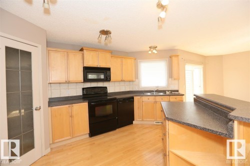10903 8 Avenue, Edmonton, AB - Indoor Photo Showing Kitchen With Double Sink
