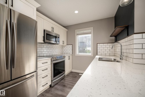 58 1391 Starling Drive, Edmonton, AB - Indoor Photo Showing Kitchen With Double Sink With Upgraded Kitchen