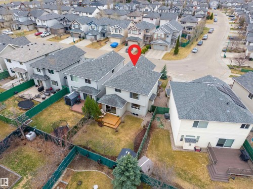 Two-story residential property featuring a neutral-toned exterior and a shingled roof - 2340 Hagen Link, Edmonton, AB - Outdoor With View
