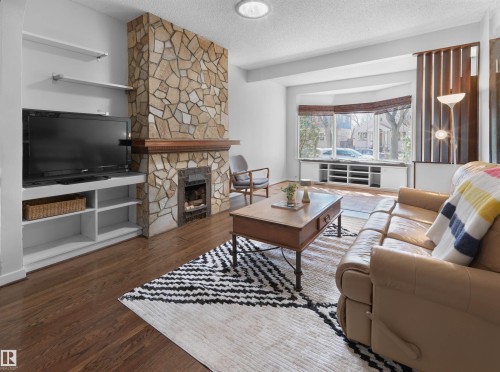 9808 90 Avenue, Edmonton, AB - Indoor Photo Showing Living Room With Fireplace