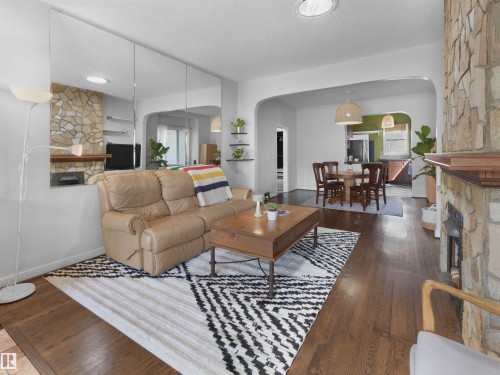 9808 90 Avenue, Edmonton, AB - Indoor Photo Showing Living Room With Fireplace
