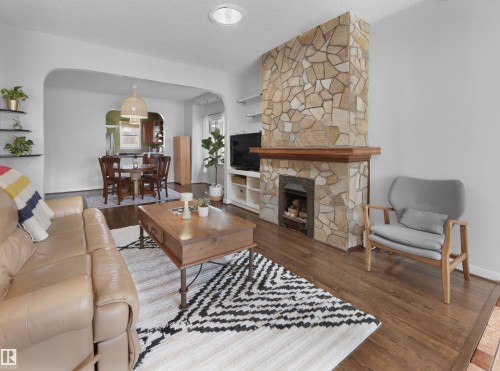 9808 90 Avenue, Edmonton, AB - Indoor Photo Showing Living Room With Fireplace