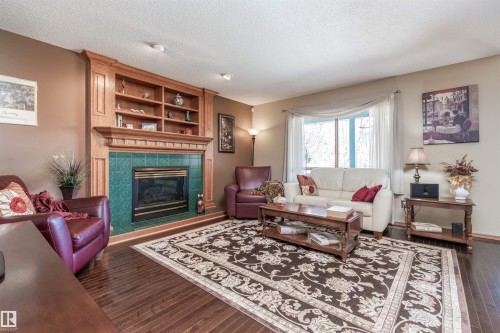 687 Meadowview Drive, Sherwood Park, AB - Indoor Photo Showing Living Room With Fireplace