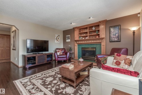 687 Meadowview Drive, Sherwood Park, AB - Indoor Photo Showing Living Room With Fireplace