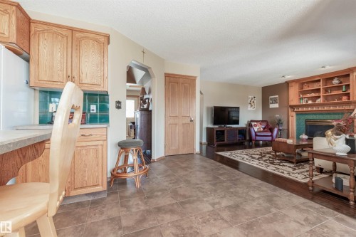 687 Meadowview Drive, Sherwood Park, AB - Indoor Photo Showing Living Room With Fireplace