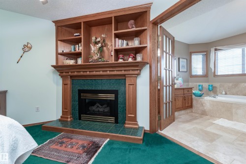 687 Meadowview Drive, Sherwood Park, AB - Indoor Photo Showing Living Room With Fireplace