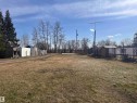 Expansive open lot featuring a clear, level area - 5211 50 Avenue, Fawcett, AB 