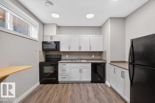 1363 Adamson Drive, Edmonton, AB - Indoor Photo Showing Kitchen With Double Sink