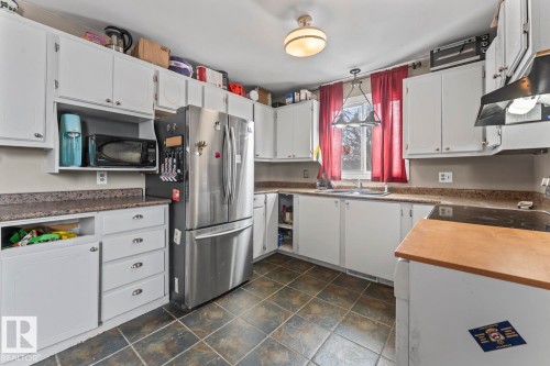 1815 Forest Drive, Cold Lake, AB - Indoor Photo Showing Kitchen With Double Sink