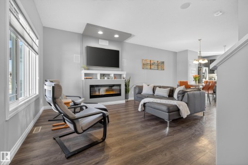 7294 Armour Crescent, Edmonton, AB - Indoor Photo Showing Living Room With Fireplace