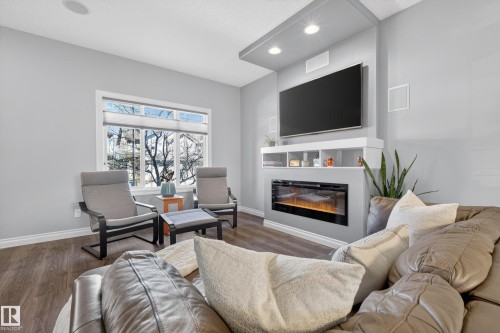 7294 Armour Crescent, Edmonton, AB - Indoor Photo Showing Living Room With Fireplace