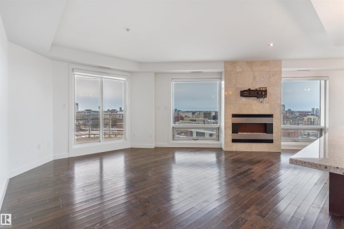 1901 10388 105 Street, Edmonton, AB - Indoor Photo Showing Living Room With Fireplace