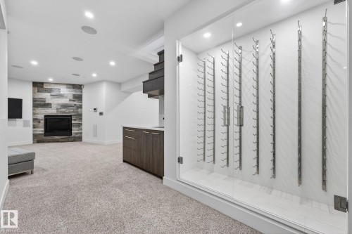 14643 92A Avenue, Edmonton, AB - Indoor Photo Showing Other Room With Fireplace