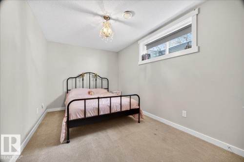 8048 18 Avenue, Edmonton, AB - Indoor Photo Showing Bedroom