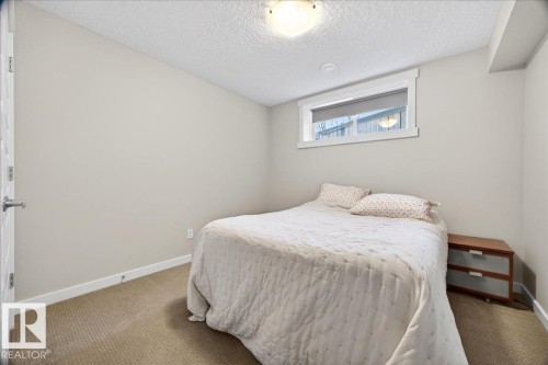 8048 18 Avenue, Edmonton, AB - Indoor Photo Showing Bedroom