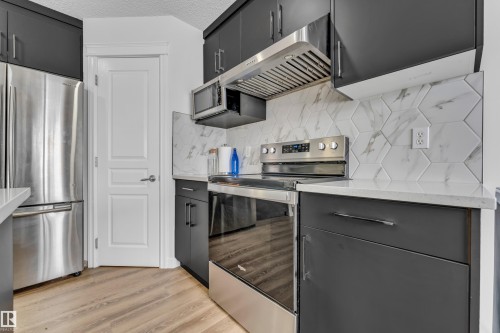 88 Bonin, Beaumont, AB - Indoor Photo Showing Kitchen