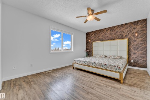 88 Bonin, Beaumont, AB - Indoor Photo Showing Bedroom