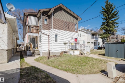 Two-story property with brown and white siding - 10831 80 Avenue, Edmonton, AB - Outdoor