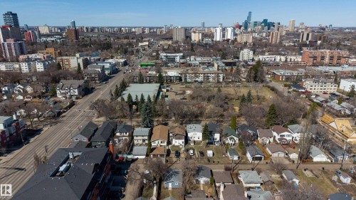 Aerial perspective showcasing a residential street with diverse housing styles - 10831 80 Avenue, Edmonton, AB - Outdoor With View