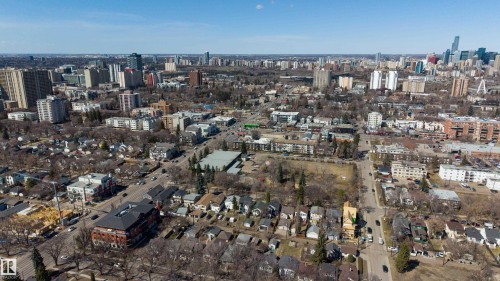 Expansive urban aerial showcasing varied architectural styles across residential and commercial properties - 10831 80 Avenue, Edmonton, AB - Outdoor With View
