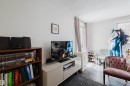 Bright interior space featuring dark wood-finish flooring and light wall tones - 10831 80 Avenue, Edmonton, AB  - Indoor 