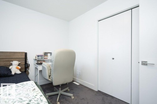 Bedroom featuring white walls and a grey carpeted floor - 5627 Kootook Place, Edmonton, AB - Indoor