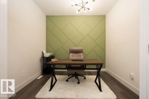 Accent wall featuring a geometric panel design - 5627 Kootook Place, Edmonton, AB - Indoor Photo Showing Office