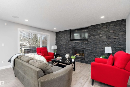 1223 117 Street, Edmonton, AB - Indoor Photo Showing Living Room With Fireplace