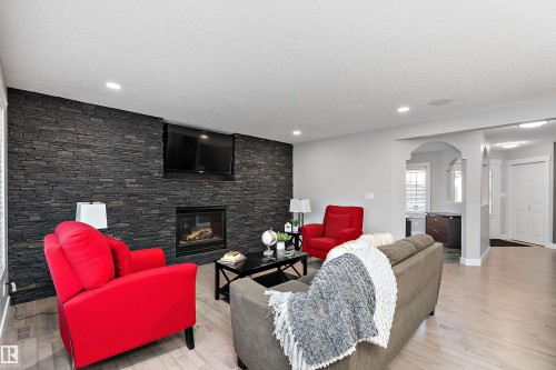 1223 117 Street, Edmonton, AB - Indoor Photo Showing Living Room With Fireplace
