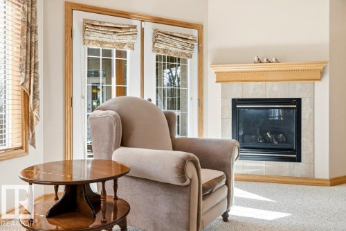 244 Wolf Willow Road, Edmonton, AB - Indoor Photo Showing Living Room With Fireplace