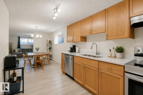 9745 71 Avenue, Edmonton, AB - Indoor Photo Showing Kitchen With Double Sink