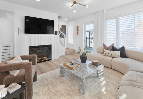 4149 Kinglet Drive, Edmonton, AB - Indoor Photo Showing Living Room With Fireplace