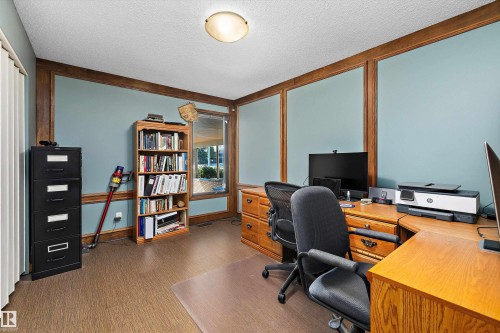 Interior space featuring wood-finish flooring and a flat-panel ceiling - 227 Westridge Road, Edmonton, AB - Indoor Photo Showing Office