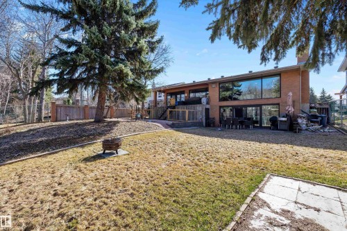 Brick exterior with expansive windows and a multi-level outdoor living space - 227 Westridge Road, Edmonton, AB - Outdoor