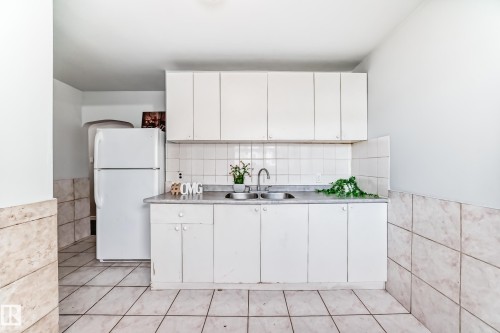 13003 Sherbrooke Avenue, Edmonton, AB - Indoor Photo Showing Kitchen With Double Sink