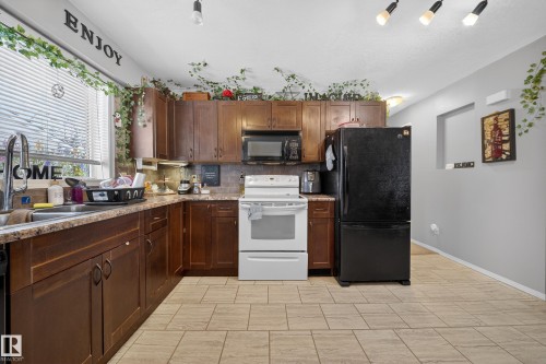 10520 52 Avenue, Edmonton, AB - Indoor Photo Showing Kitchen With Double Sink