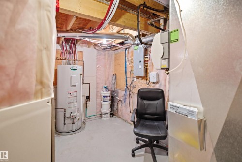 Open-concept lower level featuring exposed joists, ductwork, and partially finished walls - 7323 24 Ave, Edmonton, AB - Indoor Photo Showing Basement